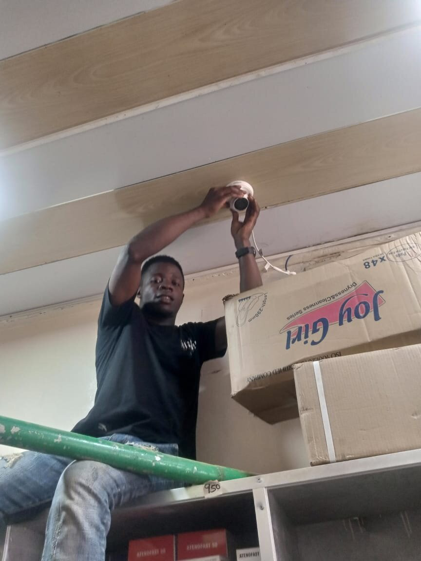 Tech Bridge team member working on technical support equipment.